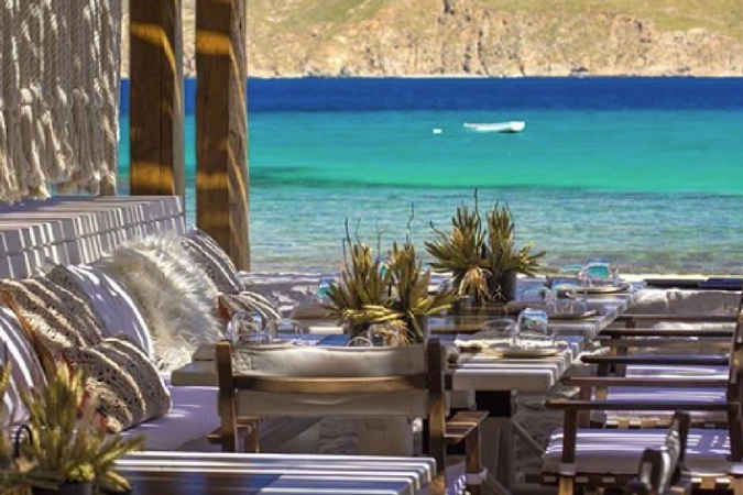 Located in Panormos beach this is one of our preferred beach clubs in  Mykonos. It is remarkably beautiful, with a beach décor and rustic comforts  difficult to find elsewhere.